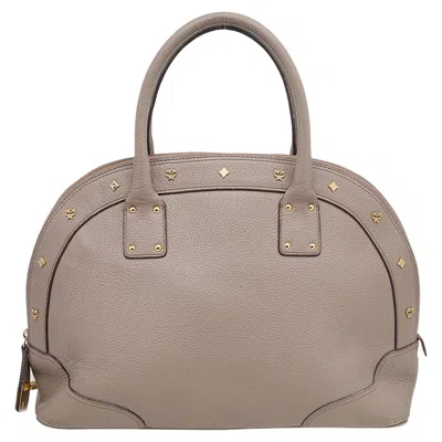 Mcm Leather Studded Alma Top Handle Dome Bag In Beige