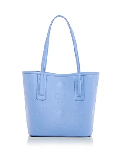 Mcm Liz Small Maxi Monogram Embossed Leather Shopper Bag In Blue