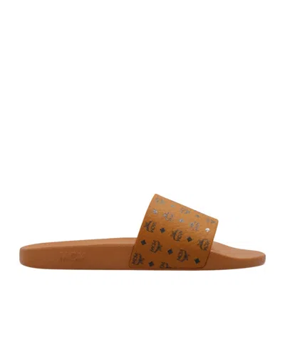 Mcm Logo-printed Slip-on Sandals In Brown