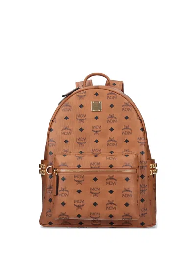 Mcm Logo Studded Backpack In Brown