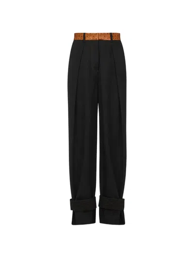 Mcm Logo-waistband Pleated Trousers In Black