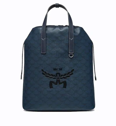 Pre-owned Mcm Medium Himmel Drawstring Lauretos Backpack In Blue/black