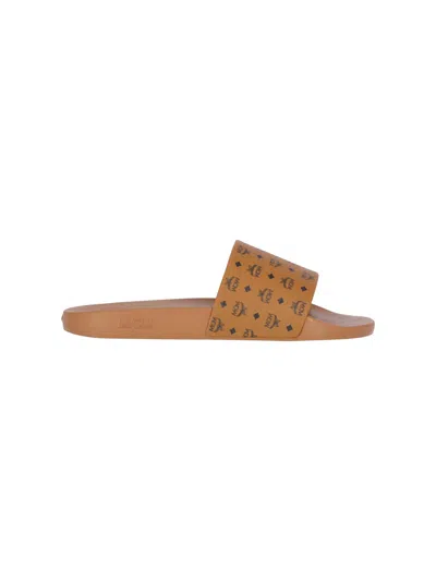 Mcm Monogram Slide Sandals In Brown
