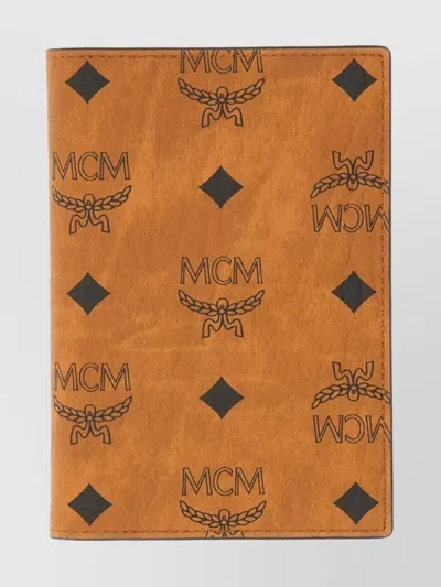 Mcm Monogrammed Passport Holder Foldable Design In Orange