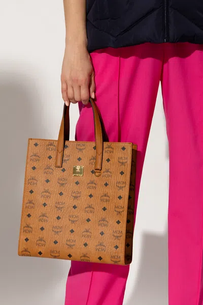 Mcm Monogrammed Shopper Bag In Brown