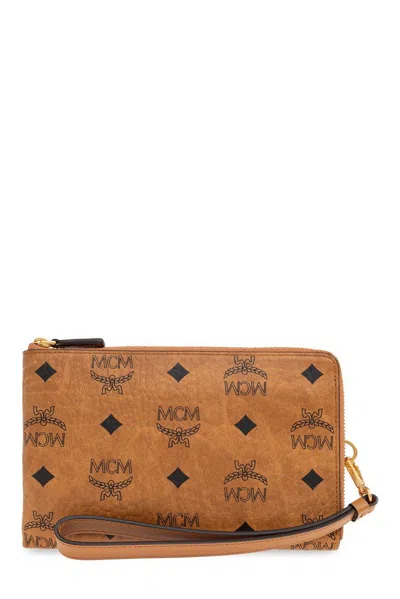Mcm Ottomar Travel Pouch In Visetos In Brown