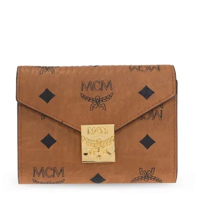 Mcm Patricia Visetos Trifold Wallet In Cognac In Brown