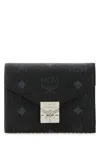 Mcm Embossed Canvas Wallet Metal Hardware