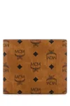 Mcm Printed Canvas Wallet In Brown