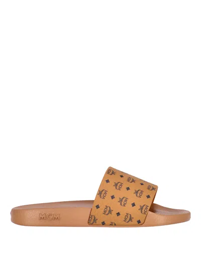 Mcm Male Monogram Print Rubber Slides In Brown