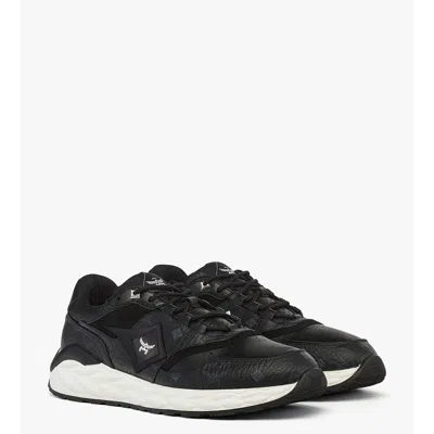 MCM SKYWANDER SNEAKERS IN VISETOS