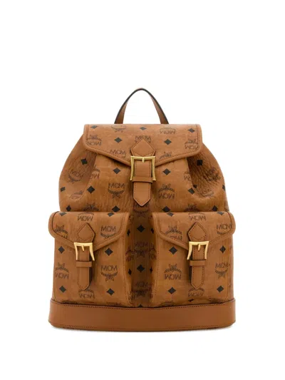 Mcm Small Aren Monogram-print Backpack In Brown
