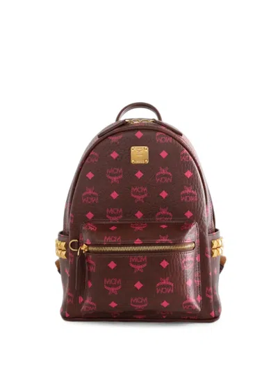 Mcm Stark Monogram-print Studded Backpack In Brown