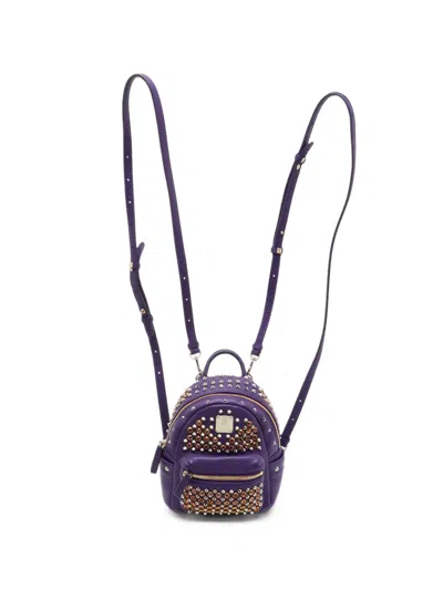 Pre-owned Mcm Stark Studded Mini Backpack In Purple