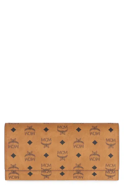 Mcm Trifold Continental Wallet In Brown