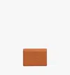 Mcm Embossed Logo Leather Mini Himmel Snap Wallet In Brown