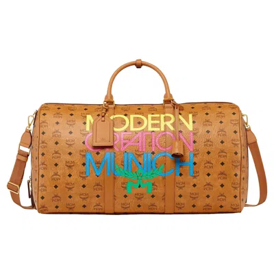 Pre-owned Mcm X Honey Dijon Ottomar Weekender In Visetos 55.5cm / 21.7" - Cognac New In Orange