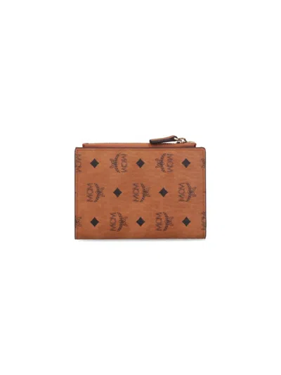 Mcm Logo Zip Wallet In Brown
