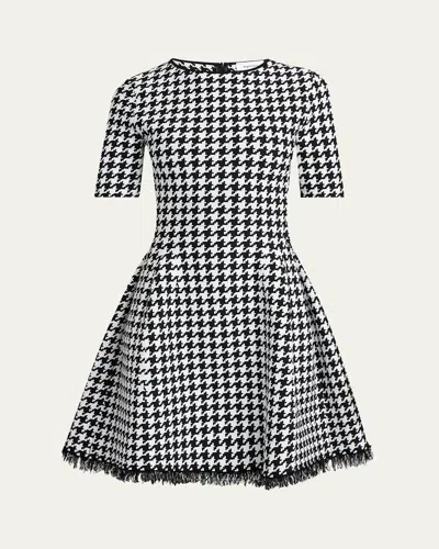 Alexander Mcqueen Houndstooth Fit-flare Fringe Knit Mini Dress In Black/ivory
