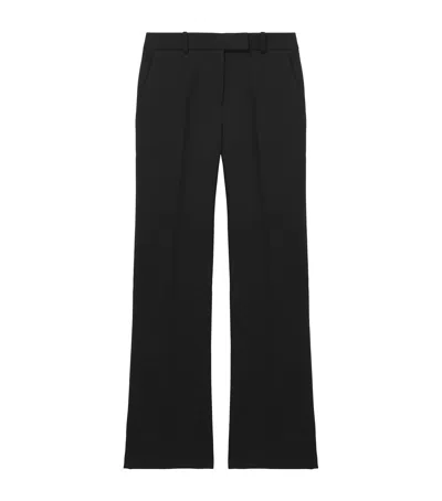 Alexander Mcqueen Wool Kickback Trousers In Black