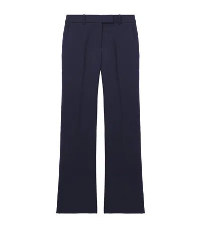 Alexander Mcqueen Wool Kickback Trousers In Blue