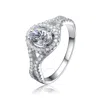 MEGAN WALFORD MEGAN WALFORD STERLING SILVER MOUNTED CUBIC ZIRCONIA SOLITAIRE WITH HALO RING