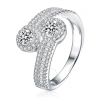 MEGAN WALFORD MEGAN WALFORD STERLING SILVER ROUND WITH BAGUETTE CUBIC ZIRCONIA BY PASS RING