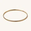 Mejuri Thin Flexi Bangle In Yellow