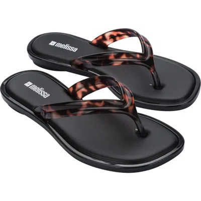 Melissa Wave Flip Flop In Black/clear Tortoise