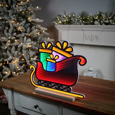 Melrose International Santa's Sleigh Ekkolight 17"l - Red, Orange, Green