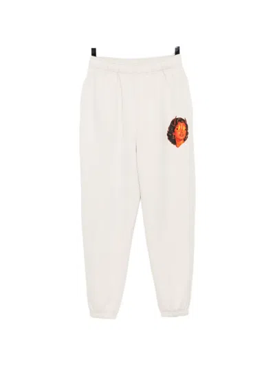 Melt Graphic-print Track Pants In Transparent