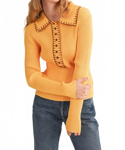 Merci Collared Ribbed Sweater With Contrast Stitch In Yellow Brown