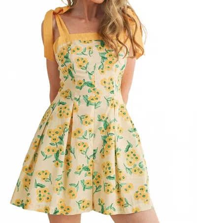 Merci Floral Pleated And Flare Romper In Custard Multi Floral