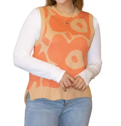 Merci Floral Sweater Vest In Coral Apricot In Orange