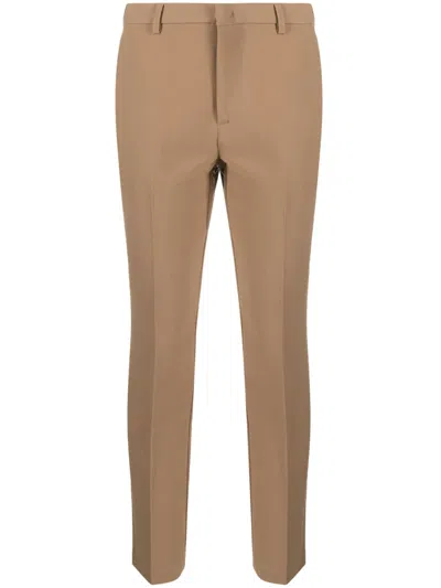 Merci Pressed-crease Slim-fit Trousers In Brown