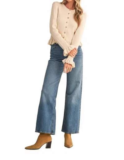 Merci Ruffle Hem Ribbed Knit Cardigan In Egg Shell In Neutral