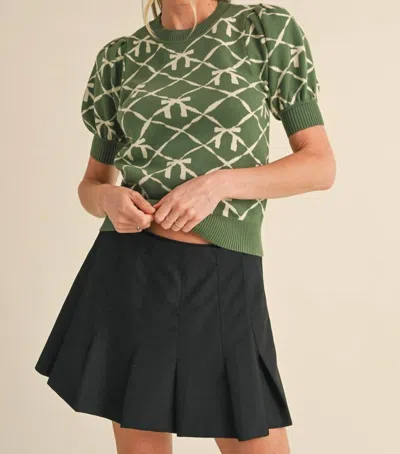 Merci Short Sleeve Bow Pattern Sweater In Olive In Green