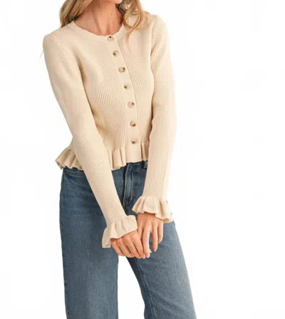 Merci The Sienna Ruffle Hem Ribbed Knit Sweater In Cream In Neutral