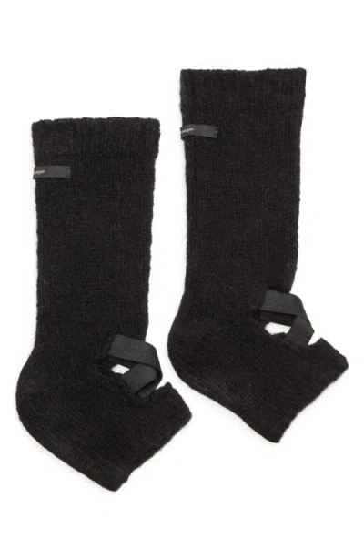 Meruert Tolegen Hand Knit Cutout Leg Warmers In Black