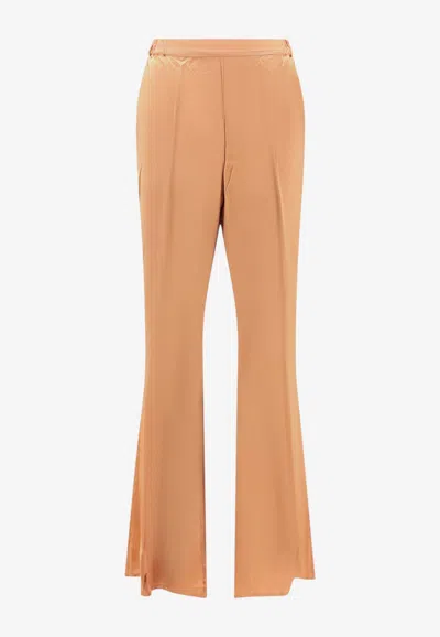 Mes Demoiselles Surail Satin Flared Pants In Beige