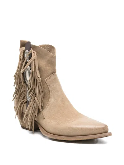 Metisse Fringed Ankle Boots In Neutral