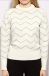 Metric Knits Metallic Zig Zag Turtleneck Sweater In Cream In White