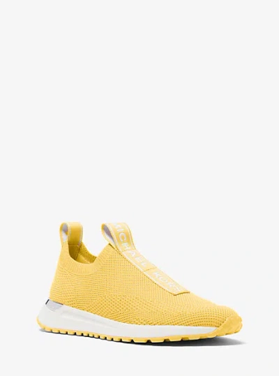 Michael Kors Bodie Logo Embossed Stretch Knit Slip-on Trainer In Yellow
