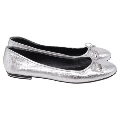 Michael Kors Bow Embellished Ballet Flats In Metallic Silver Leather