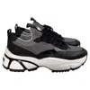 Michael Kors Darius Two-tone Stretch Knit Trainer In Black And White Synthetic
