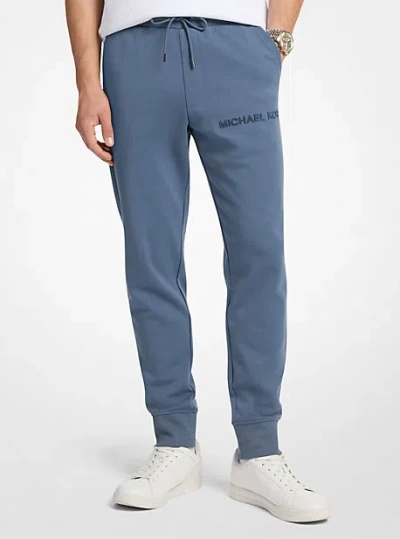 Michael Kors Embossed Logo Cotton Blend Joggers In Blue