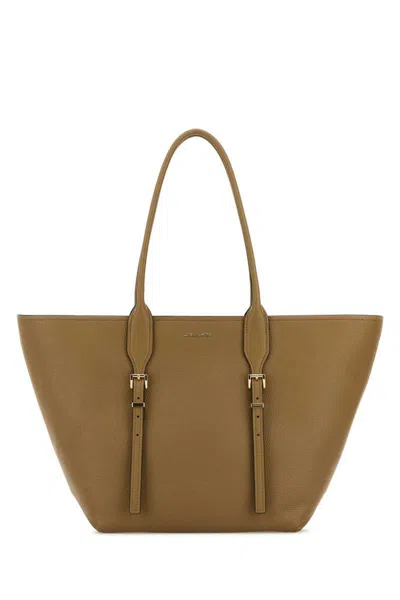 Michael Kors Handbags. In Brown