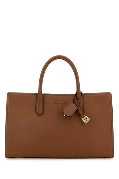 Michael Kors Handbags. In Beige O Tan