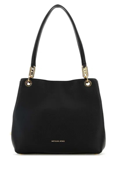 Michael Kors Handbags. In Black