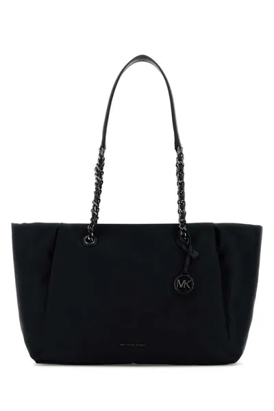 Michael Kors Handbags. In Black